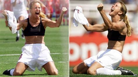 female soccer players without shirts.